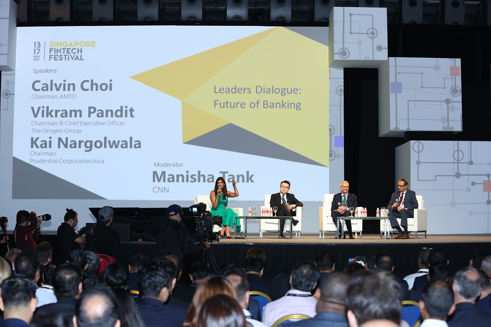 People moving through a Singapore fintech event